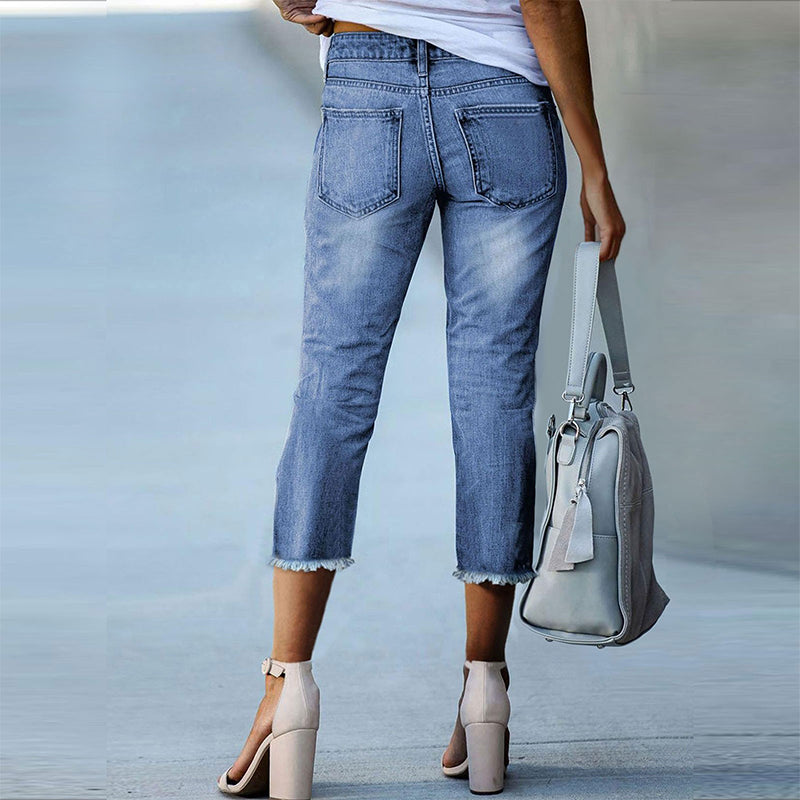 Pantalones vaqueros elásticos desgastados