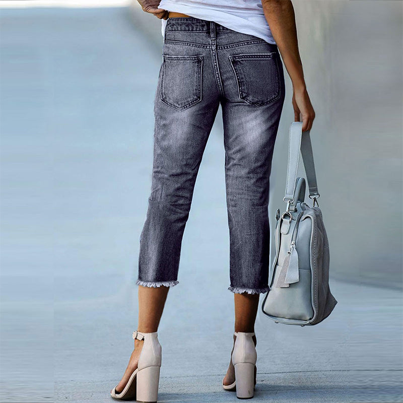 Pantalones vaqueros elásticos desgastados