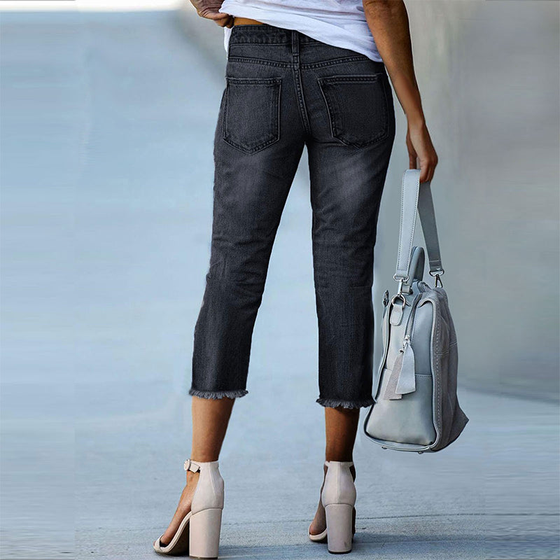 Pantalones vaqueros elásticos desgastados
