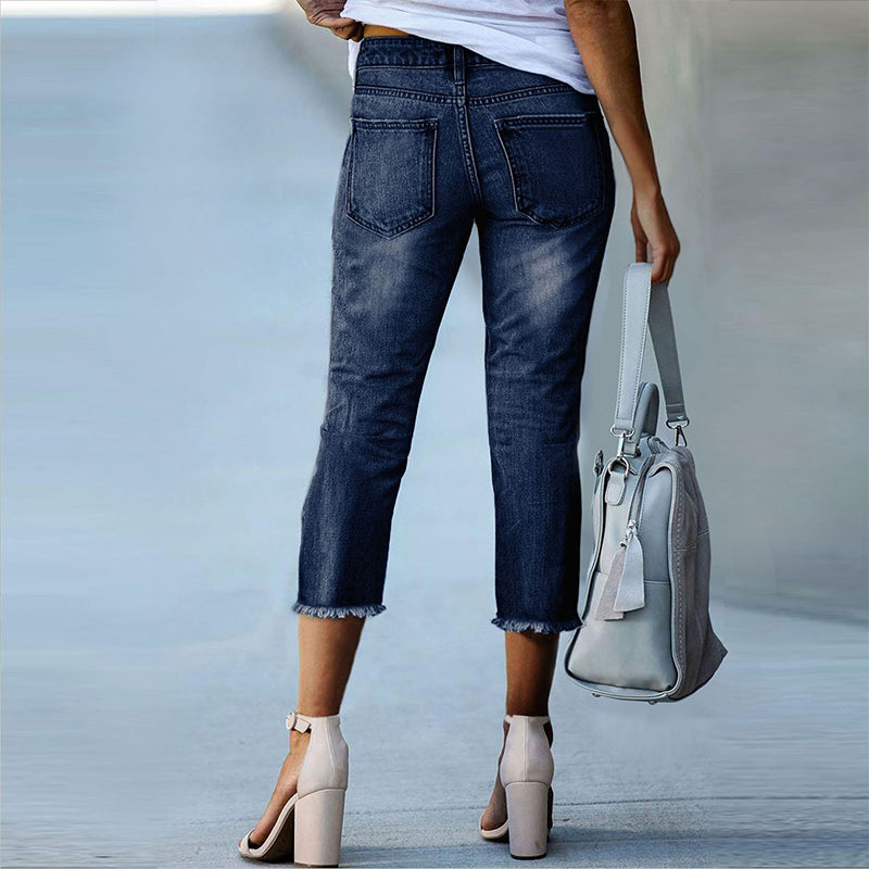 Pantalones vaqueros elásticos desgastados
